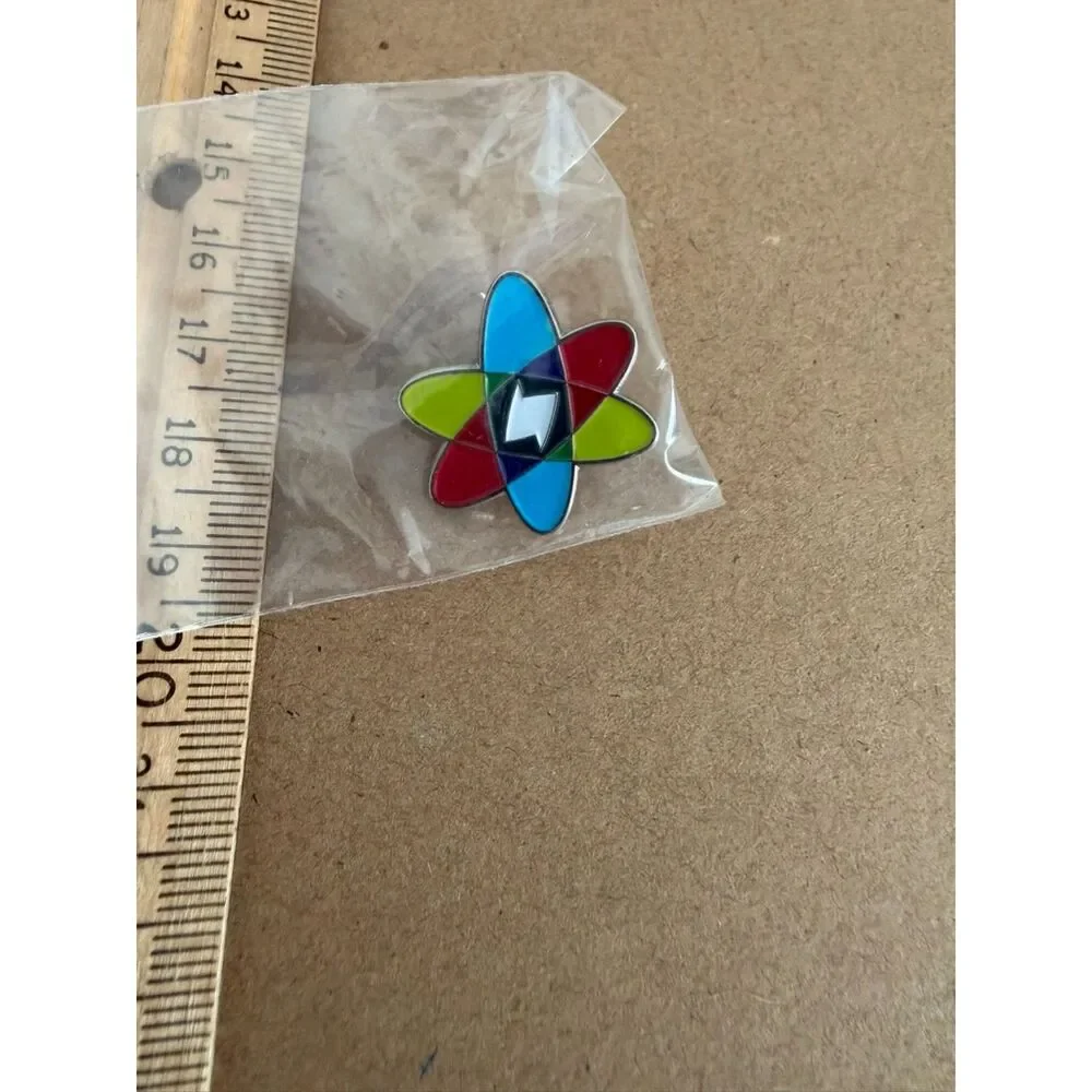 Atomic symbol Rainbow enamel lapel pin